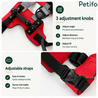 Close-up of the red blind dog harness showing the quick-release buckle and adjustable neck and chest straps.