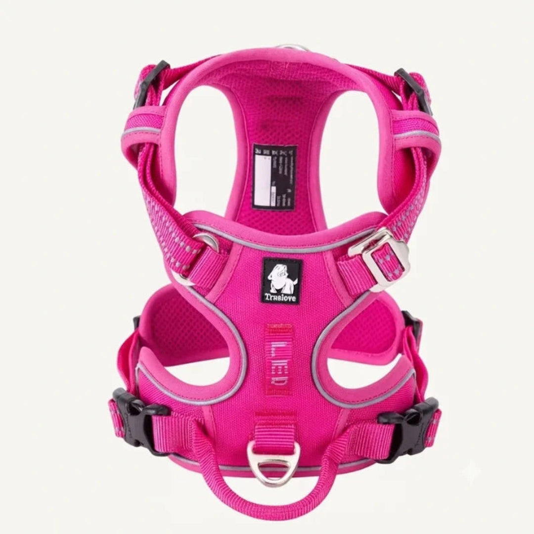 Bright pink Truelove adjustable dog harness with reflective piping and chest plate.