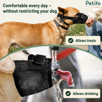 Dog wearing the black mesh muzzle while being fed a treat and drinking water comfortably.