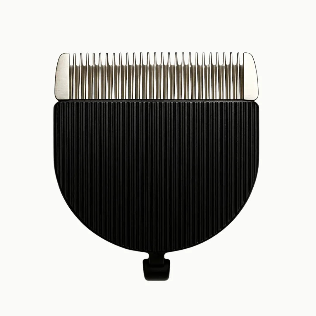 Studio product shot of a black and silver replacement clipper blade attachment featuring fine metal teeth and a ridged casing.
