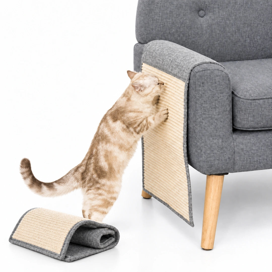 Cat using one PawHut sofa scratch protector with the second protector visible beside it - Petifo