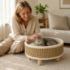 Cat resting in the PawHut woven seagrass pet bed - Petifo